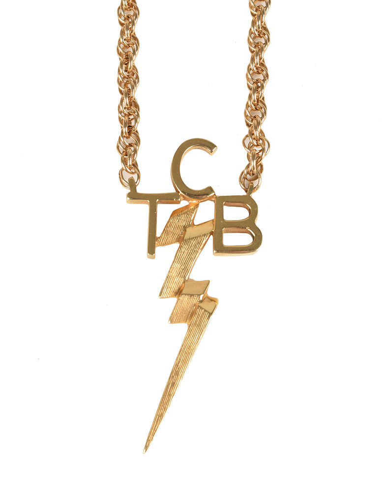 Elvis Presley's 14K gold "TCB" necklace RR Auction