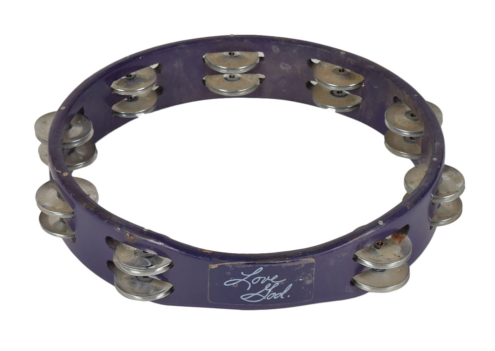 Prince's rehearsal-used “Purple Rain” tambourine RR Auction
