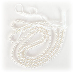 sell Princess Diana memorabilia Pearls used as part of Princess Diana's wedding dress. Sold by RR Auction.