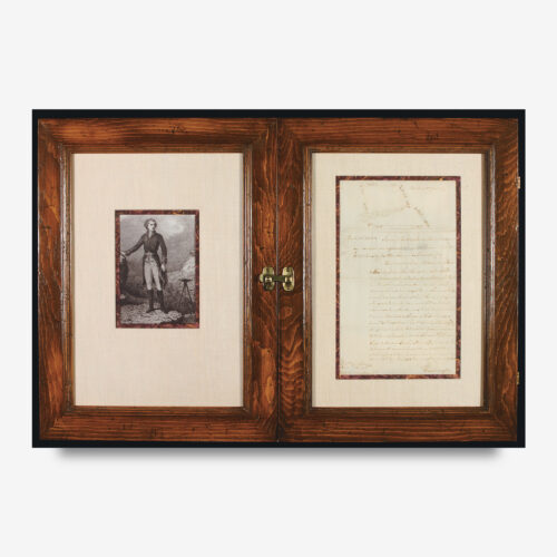 autograph document signed by George Washington framed in a wooden frame
