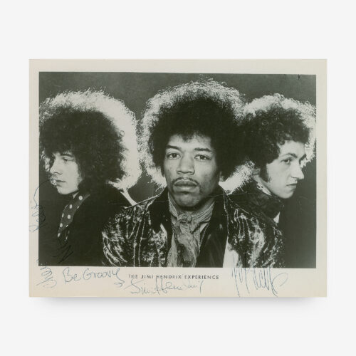 Brilliant vintage glossy 10 x 8 publicity photo of The Jimi Hendrix Experience, signed in the lower border in black ballpoint, "Be Groovy, Jimi Hendrix," "Cheers, Noel Redding," and "Mitch."